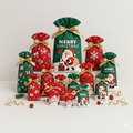 Collection of Christmas-themed gift bags and boxes on a white background